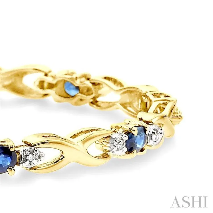 4x3mm Oval Cut Sapphire and 1/10 Ctw Single Cut Diamond Bracelet in 14K Yellow Gold