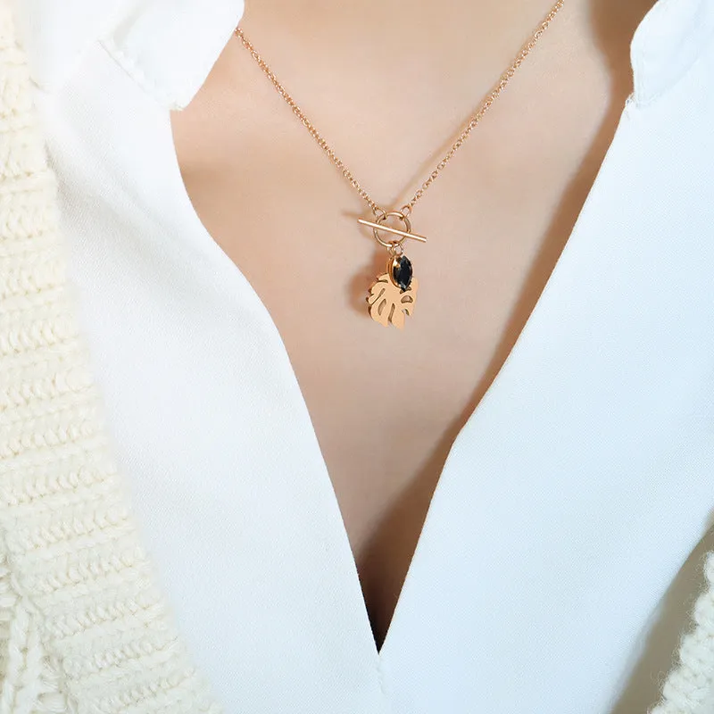 Elegant 18k Gold-Plated Titanium Steel Necklace with Black Zircon Leaf Pendant