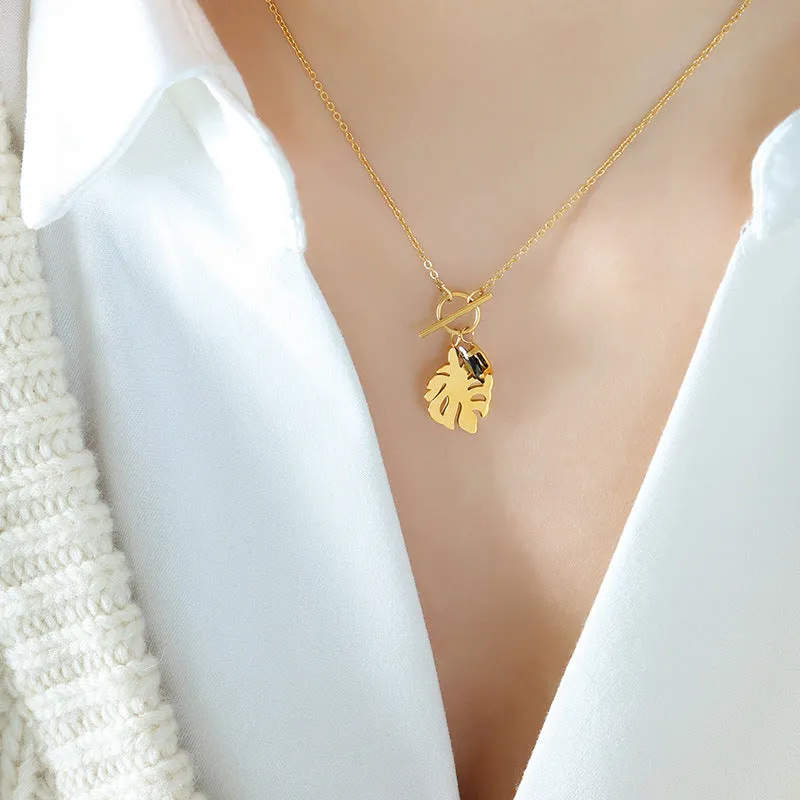 Elegant 18k Gold-Plated Titanium Steel Necklace with Black Zircon Leaf Pendant