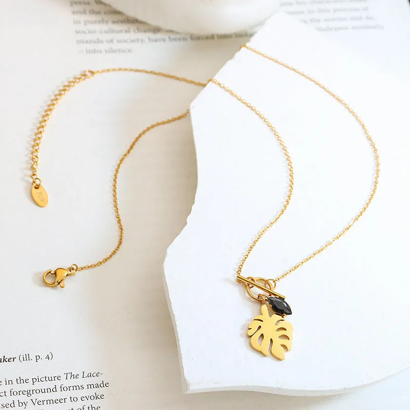 Elegant 18k Gold-Plated Titanium Steel Necklace with Black Zircon Leaf Pendant