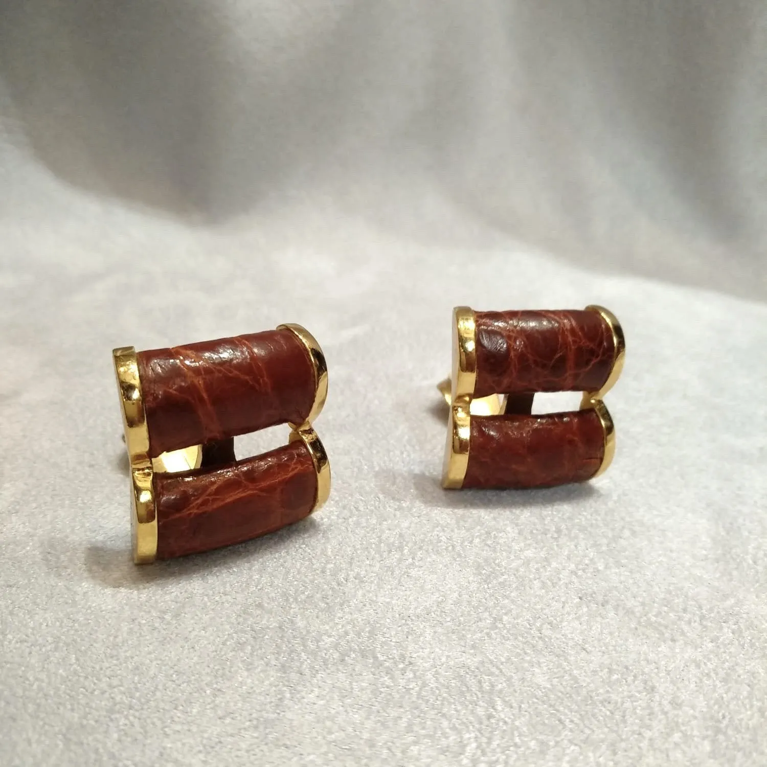 Loewe Brown leather earrings croc effect