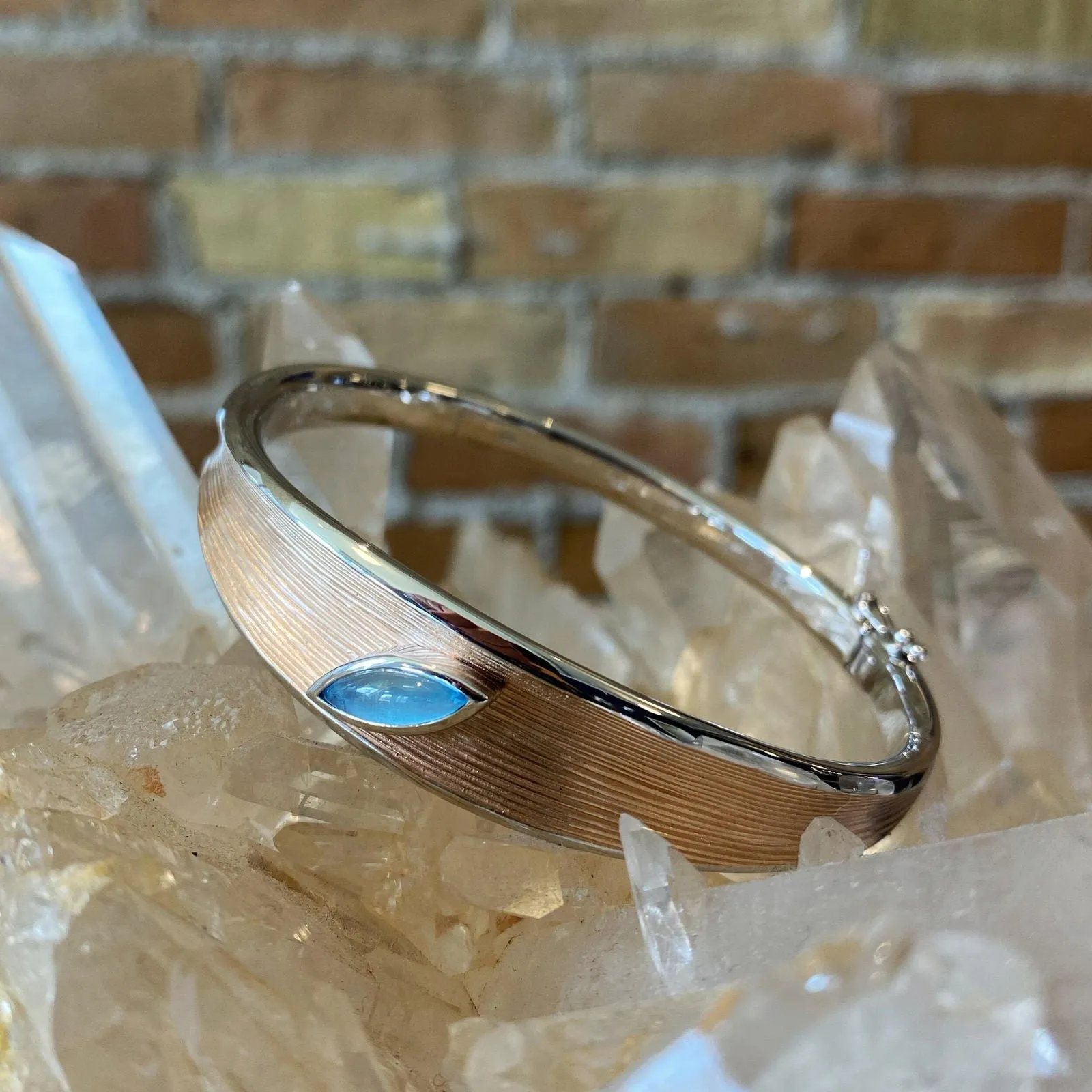 Two Tone Bangle with Blue Topaz Accent